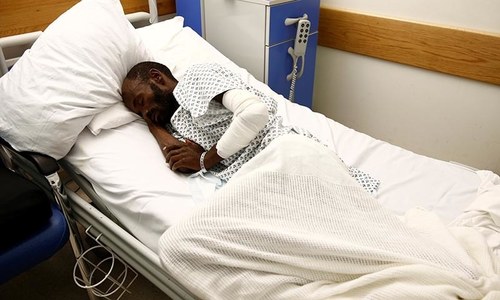 Migrants jump off rescue boat in attempt to reach Italian island