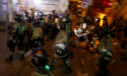 Hong Kong police arrest 36, youngest aged 12, after running battles with protesters