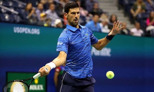 Djokovic survives injury scare to advance at US Open