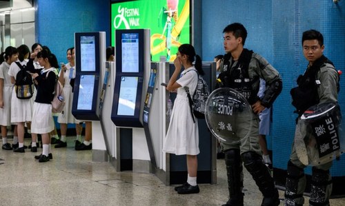 Hong Kong protesters call student boycott, strike after weekend of violence