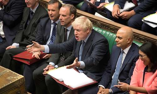 British MPs inflict new defeat on Johnson's Brexit strategy