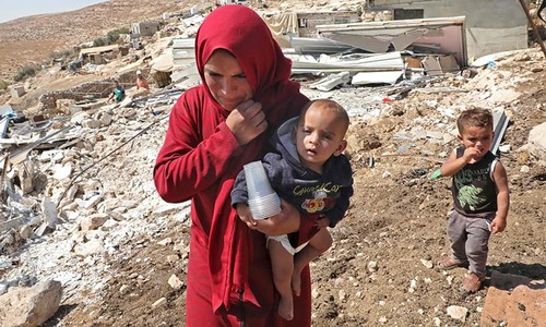 Unable to vote, Palestinians shrug off Israel's elections