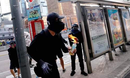 Tear gas, Molotovs and brawls mark 99th day of Hong Kong protests