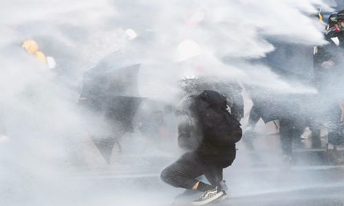 Tear gas, Molotovs mark 99th day of Hong Kong protests