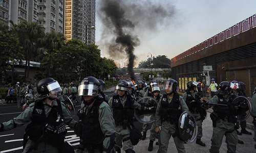 Police storm mall as Hong Kong protesters turn violent once again