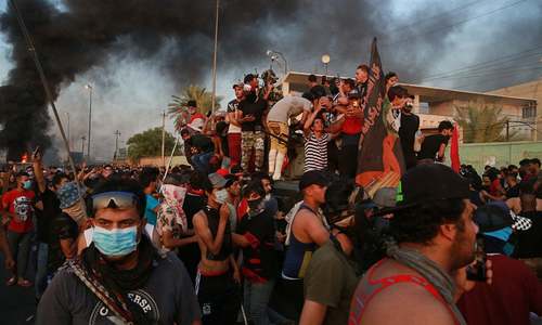 Death toll surges to 44 as Iraq unrest accelerates; no "magic solution" says PM