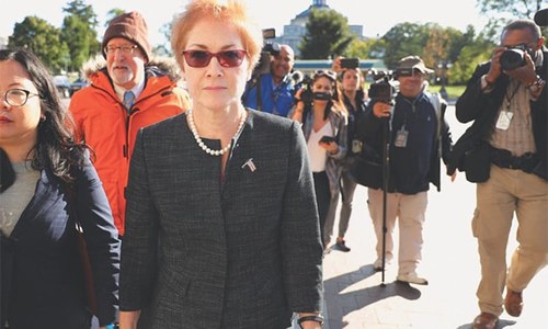 Ex-envoy tells impeachment inquiry Trump ousted her over &lsquo;false claims&rsquo;