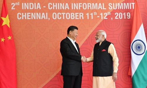 Xi and Modi discuss proposals to improve ties hit by India's action in occupied Kashmir Xi and Modi discuss proposals to improve ties hit by India's action in occupied Kashmir
