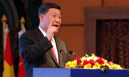 China's Xi warns attempts to divide China will end in 'shattered bones'