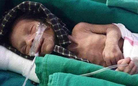 Man burying daughter finds newborn alive in grave in northern India Man burying daughter finds newborn alive in grave in northern India