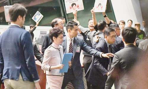 Hong Kong MPs shout down pro-Beijing leader