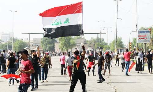 Protesters march towards Baghdad's fortified Green Zone as anti-government protests resume