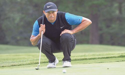 Woods three shots clear as PGA Tour win record beckons
