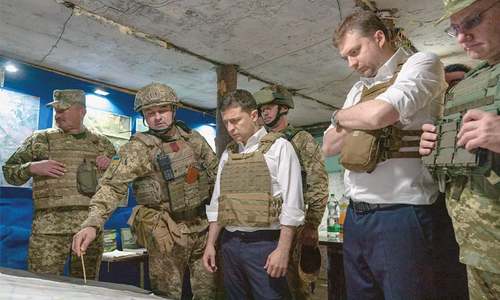 Ukraine, separatists launch troop withdrawal