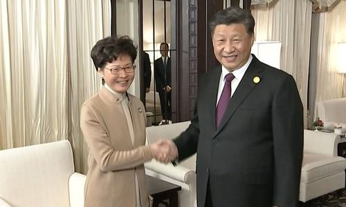 Xi voices 'high degree of trust' in Hong Kong leader over unrest