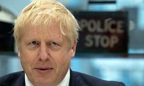 Cabinet resignation hits Johnson as UK election drive kicks off