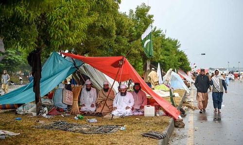 Azadi March participants undeterred by rain