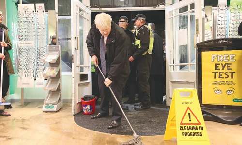 Floods become UK election issue as parties spar over funding