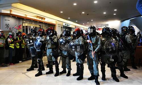 China calls for tough security laws to end Hong Kong turmoil