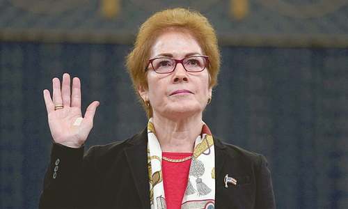 Ousted envoy recalls horror after Trump denounced her