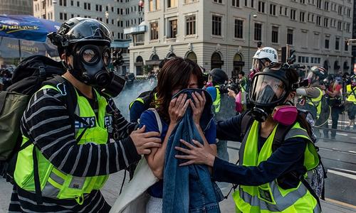 HK police fire tear gas as thousands take to streets in fresh protests
