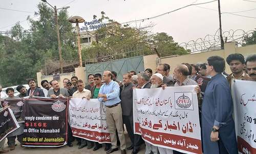 'An attack on Dawn is an attack on us all': Journalists rally against siege of Islamabad offices