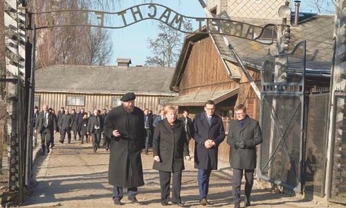 Merkel voices &lsquo;deep shame&rsquo; on first  visit to Auschwitz
