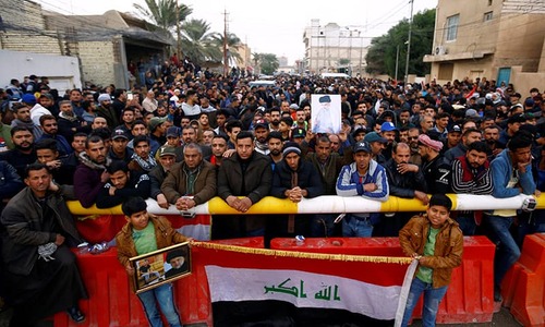 Tensions flare as gunmen kill 17 protesters in Baghdad