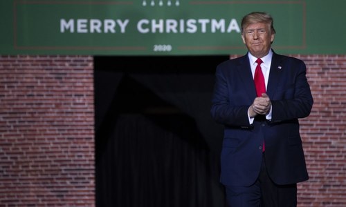 Defiant Trump holds record-long rally on impeachment day