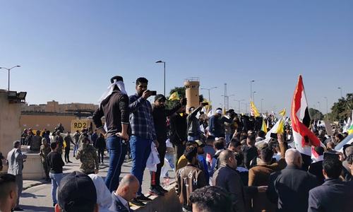 Angry Iraq protesters attack US embassy over air strikes