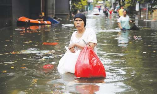 Thousands in shelters as Indonesia flood death toll hits 60