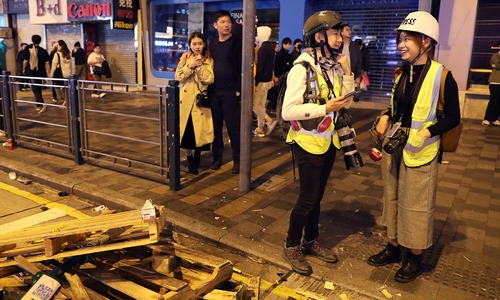 Tear gas and water cannons: Hong Kong students brave the front lines to livestream protests