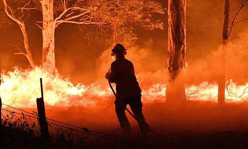 Australia urges quarter of a million to flee as winds fan huge bushfires