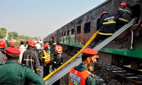 Wooden rail sleepers &lsquo;scrap&rsquo; burnt in Gujranwala
