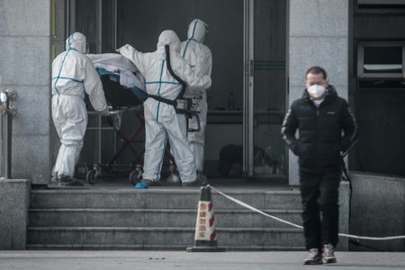 China confirms human-to-human transmission as SARS-like virus spreads