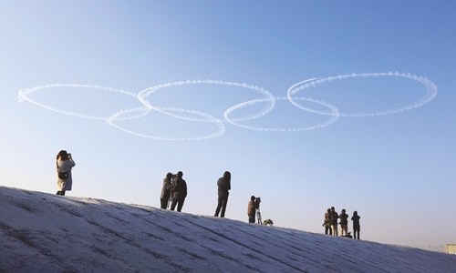 Fireworks, rings monument light up Tokyo six months before Games
