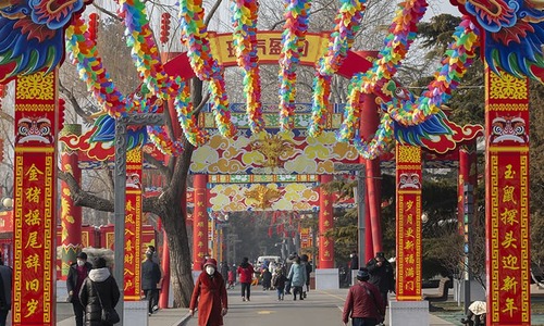 Prayers and celebrations: China welcomes 'Year of the Rat' amid deepening health crisis