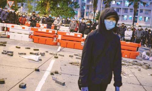 Hong Kong protesters torch planned virus quarantine building