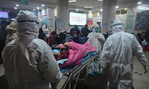 Chinese premier visits virus epicentre as death toll hits 80