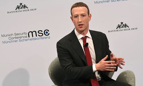 Treat us like something between a telco and a newspaper, says Facebook's Zuckerberg