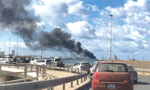 Rebels pound port in Libyan capital with rocket fire
