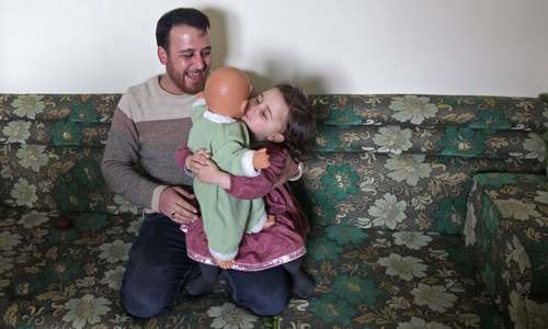 Dealing with trauma: Syrian father teaches 3-year-old daughter to laugh every time a bomb falls