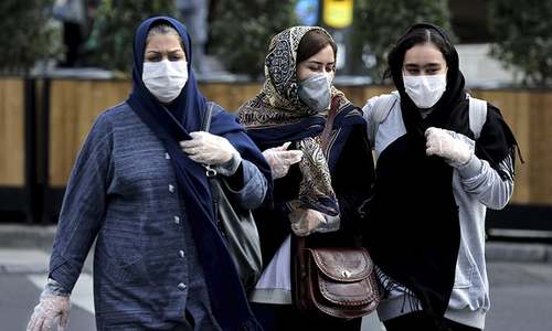 Amid disqualifications and coronavirus cases, conservatives claim victory in Iran polls