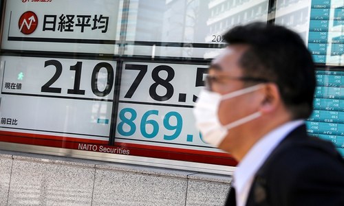 Asia stocks tumble on virus fears after Wall Street plunge