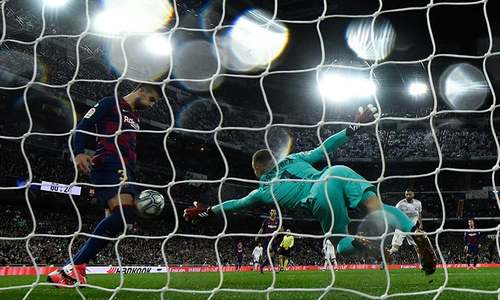 Real Madrid defeat Barcelona in Clasico to regain top spot in Spanish league Real Madrid defeat Barcelona in Clasico to regain top spot in Spanish league