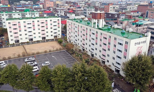 An aerial view shows closed apartment buildings after 46 residents were confirmed to have the COVID-19 coronavirus on March 7. — AFP