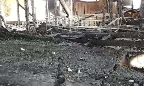 Amid tensions, blaze damages refugee centre on Greek island