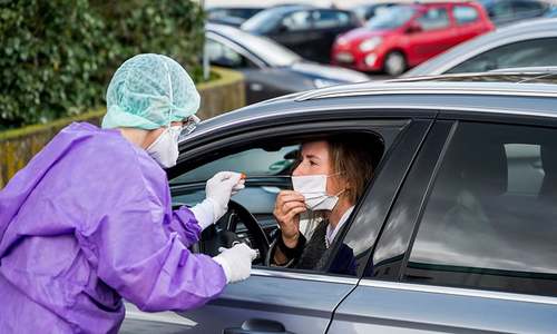 German hospital creates drive-through for swab testing as coronavirus cases rise in Europe German hospital creates drive-through for swab testing as coronavirus cases rise in Europe