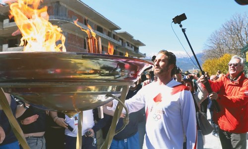 Japan says Olympics on track as Abe and Trump talk on coronavirus