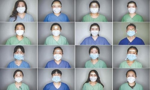 This shows nurses from Keimyung University hospital posing for portraits. —AFP